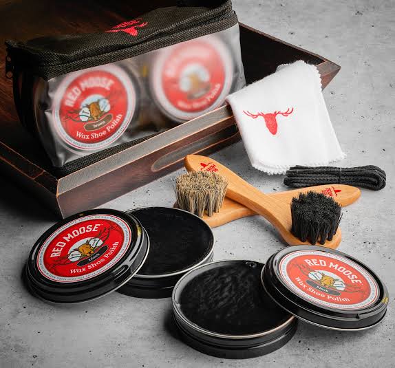 pack of leather polish and brushes